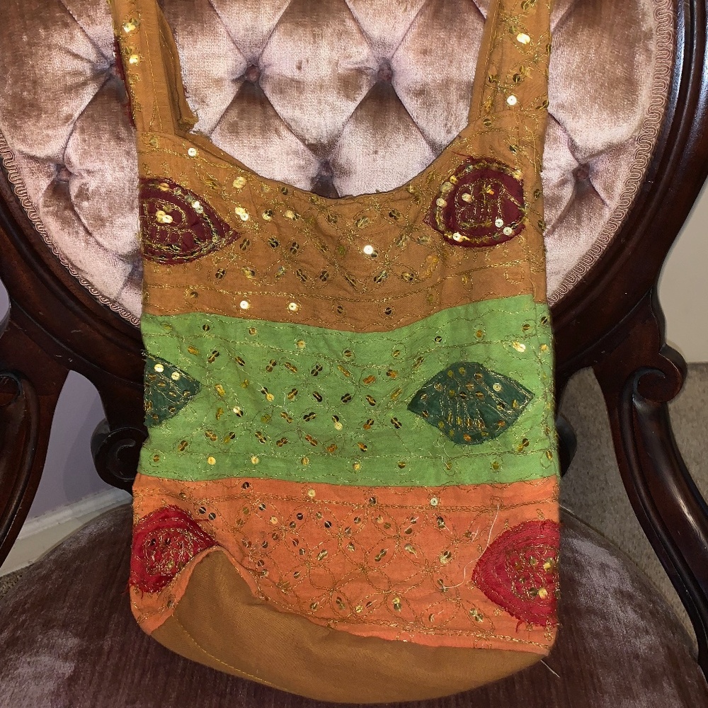 Multi colored  hand beaded  cross bag